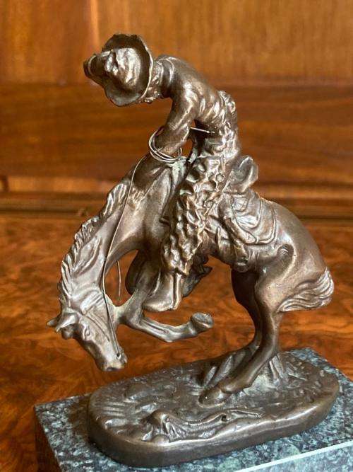 Pair of small Remington Bronzes ( 11 cm high )