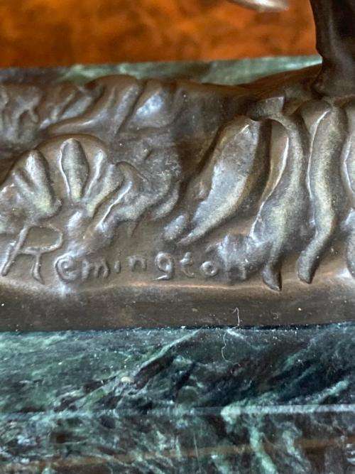 Pair of small Remington Bronzes ( 11 cm high )