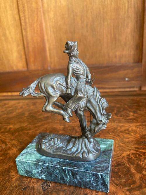 Pair of small Remington Bronzes ( 11 cm high )