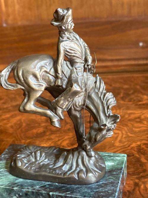 Pair of small Remington Bronzes ( 11 cm high )