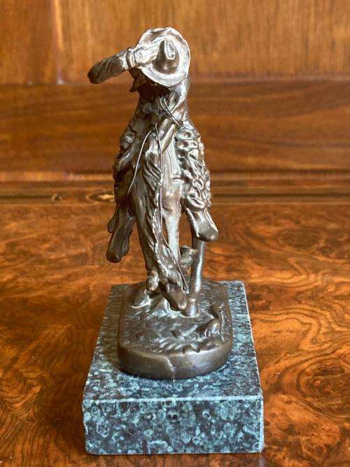 Pair of small Remington Bronzes ( 11 cm high )