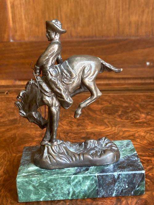 Pair of small Remington Bronzes ( 11 cm high )