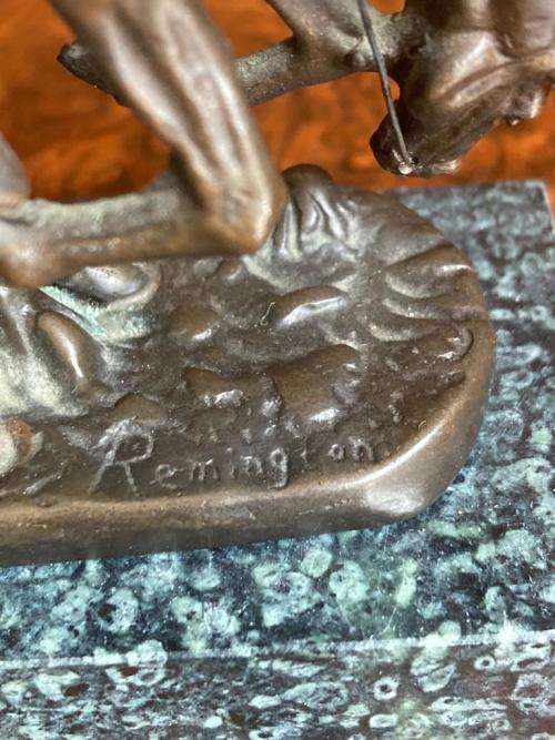 Pair of small Remington Bronzes ( 11 cm high )
