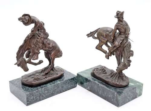 Pair of small Remington Bronzes ( 11 cm high )