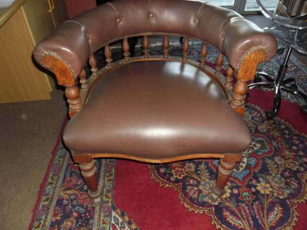 LIBRARY CHAIR IN LEATHER ON CASTORS