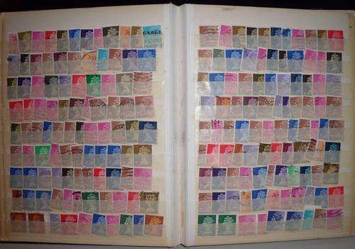 1000+ GB stamps in old stamp album