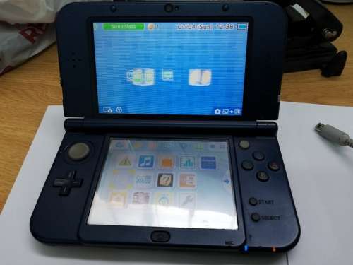 NINTENDO 3DS XL WITH 6 GAMES
