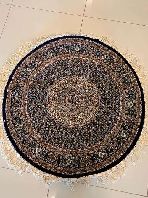 Round design Persian carpet