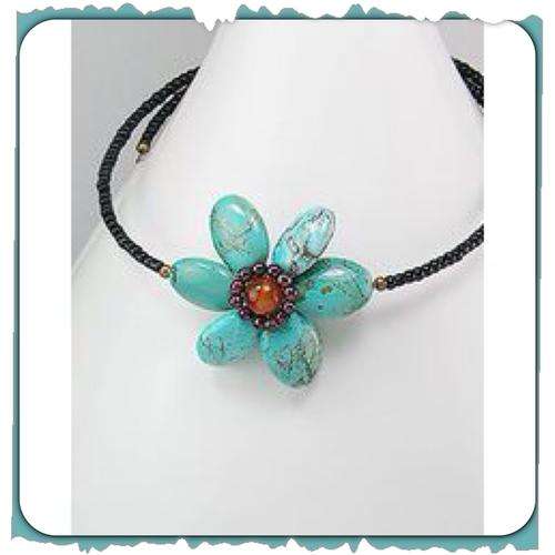 **SOO.. PRETTY AND UNUSUAL**EARTH FLOWER with carnelian, turquoise and garnets
