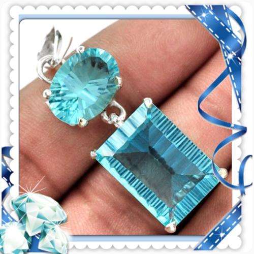 ***SPECTACULAR ***SKY BLUE CONCAVE CUT BLUE TOPAZ 925 STERLING SILVER PENDANT