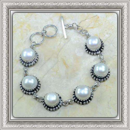 ***TOUCH OF ELEGANCE*** NATURAL RIVER PEARL , .925  SILVER BRACELET