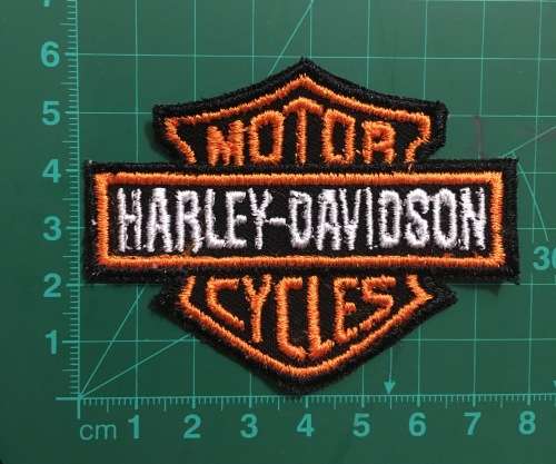 Harley Davidson badge patch in black, orange and white