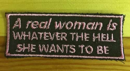 BDG172 SALE!!!!! A real woman .... slogan badge patch