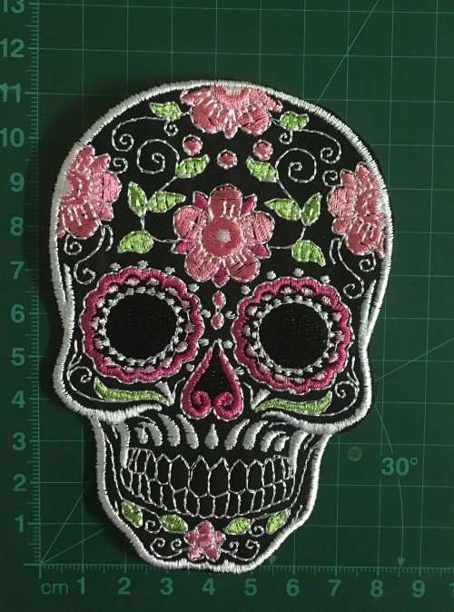 BDG315 Sugar skull badge patch in purple on black