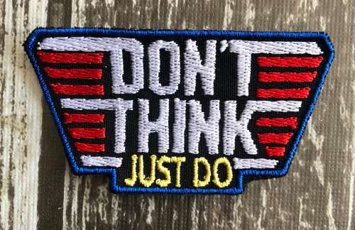 Top gun badge patch with words