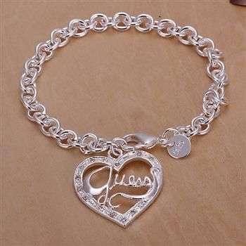 STERLING SILVER 925 FILLED LADIES BRACELET WITH "GUESS" CHARM