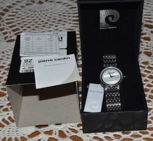 PIERRE CARDIN LADIES  WHITE MOTHER OF PEARL QUARTZ WATCH -  GREAT LOOKING WATCH -