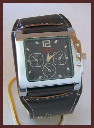 BROWN WATCH WITH SILVER FACE