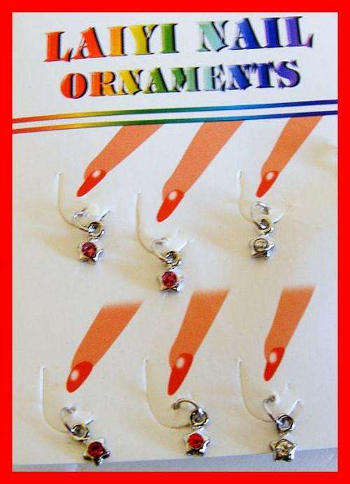 6 NAIL ORNAMENTS INCLUDING DRILL
