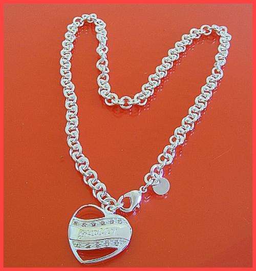 SILVER GUESS DIAMANTE PENDANT AND CHAIN