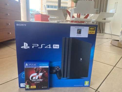 Sony PlayStation 4 PS4 PRO 1TB with 2 controllers & Gran Tourismo (Very good condition)