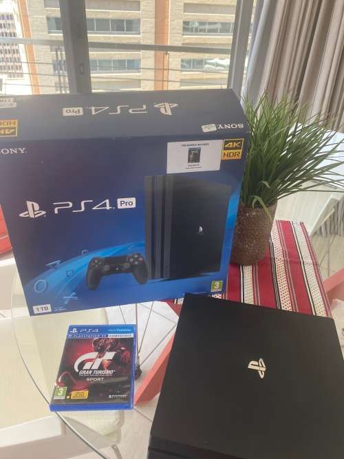 Sony PlayStation 4 PS4 PRO 1TB with 2 controllers & Gran Tourismo (Very good condition)