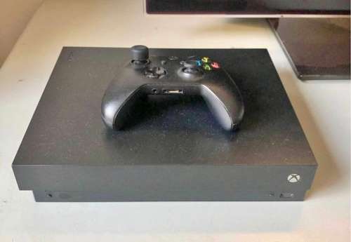 Xbox One X 1TB with 1 controller & game (good condition - black no box)
