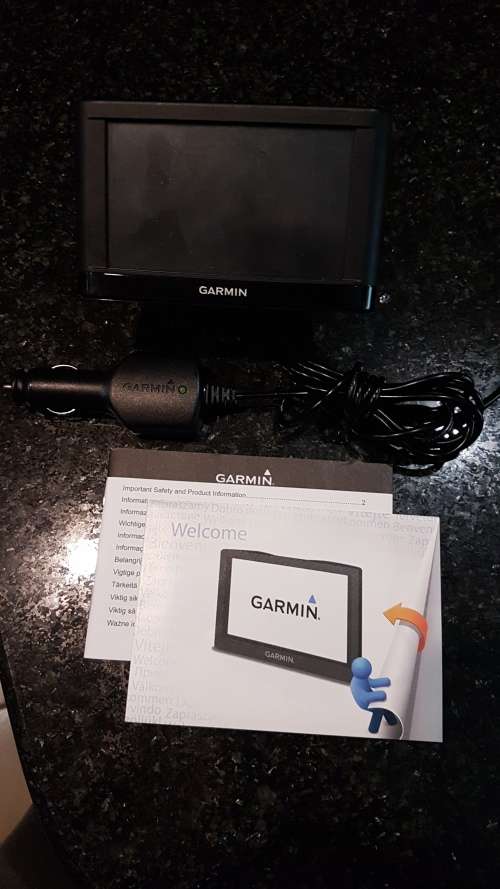 Garmin GPS Navigation System - Includes GPS, charger, windscreen mount and booklets