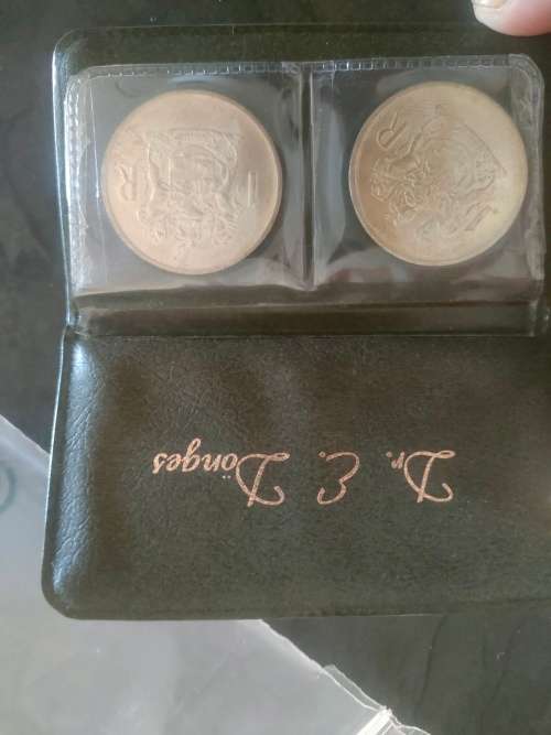 1969 English and Afrikaans R1 coins in holder.