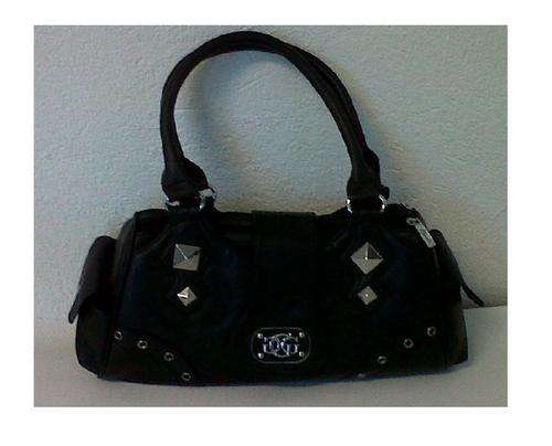 Stunning Black Leather Handbag. Has various compartments. Free bag charm!!!