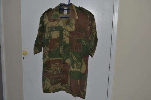 Rhodesian Short Sleeve Camo Shirt with Army breast badge and Corporal stripe. Statesman.