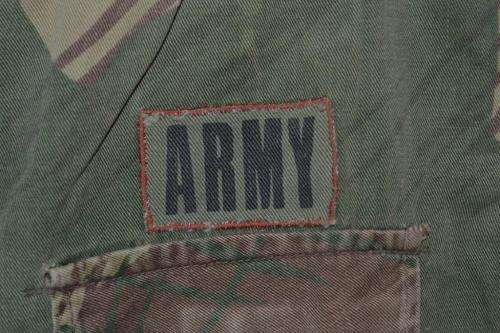 Rhodesian Short Sleeve Camo Shirt with Army breast badge and Sergeant stripe.