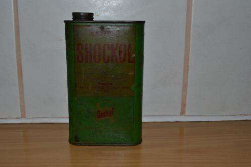 Old tin of Castroll Shockol.