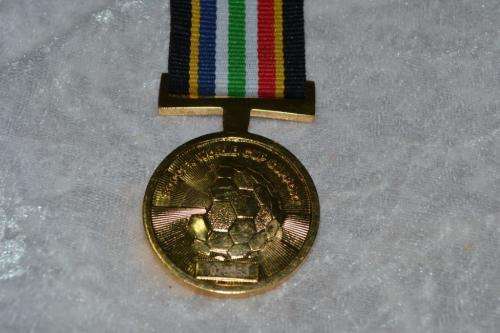Full Size SAPS Soccer World Cup medal.