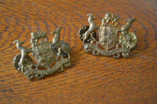 Pair of WO2 metal sleeve ranks.