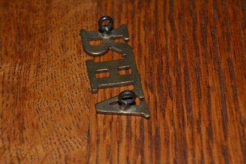 Royal Horse Artillery Shoulder title. Lugs Intact.