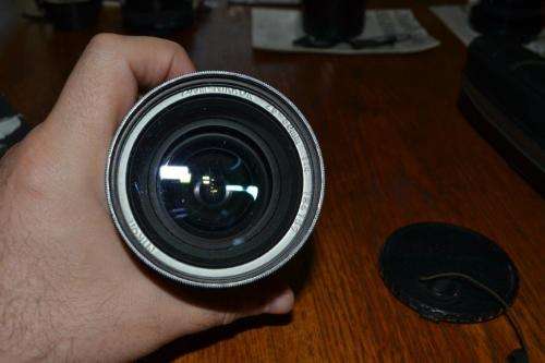 Nikon Zoom-Nikkor 25-50 mm 1:4 Zoom Wide Angle Lens.