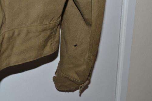 Bunny Jacket. Has some condition issues as per pictures. Armpit to armpit 41 Cm.