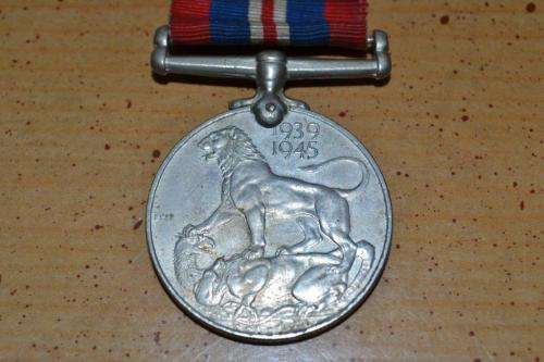 Full Size WWII British War Medal to 238594 A.F.J. du Toit.