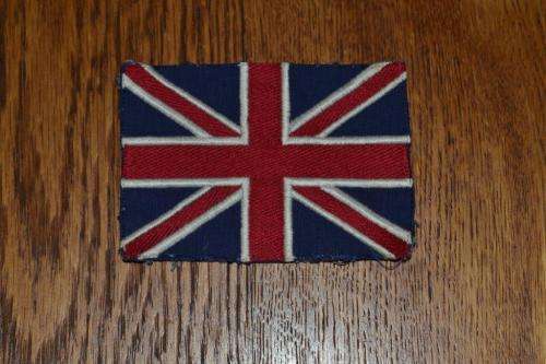Union Jack cut from old Rhodesian Car pennant. 11 Cm x 7 Cm.