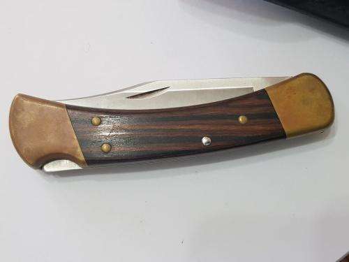 Old Buck 110 Pocketknife with Sheath.