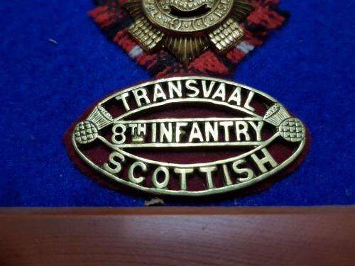 Transvaal Scottish Badges on tartan backings. All lugs intact.
