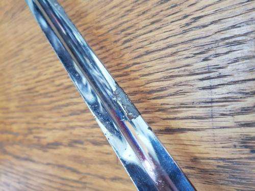 Old SADF Sword. No scabbard and chrome is separating from the blade.