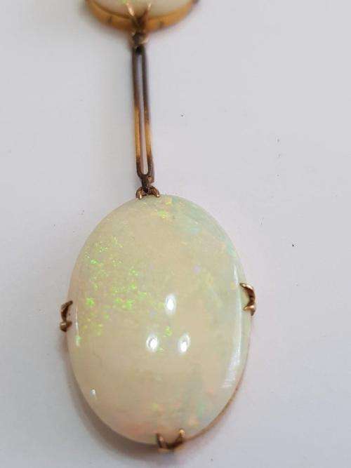 9 ct Yellow gold chain set with 2 stunning Opals.
