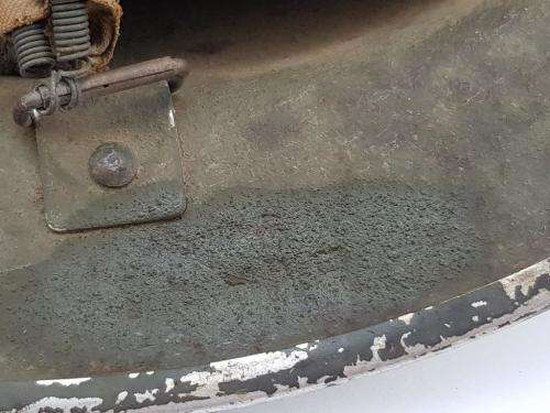 British WWII Helmet. Complete with liner and chin strap.