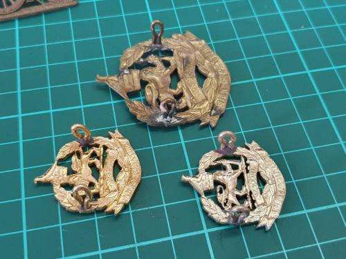 Rhodesian Corps of Military Police Cap and collar badges.