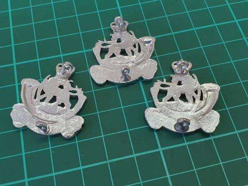 Rhodesian Light Infantry Cap and collar badges.