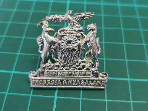 Rhodesia and Nyasaland Internal Affairs Hat Badge. One lug broken.