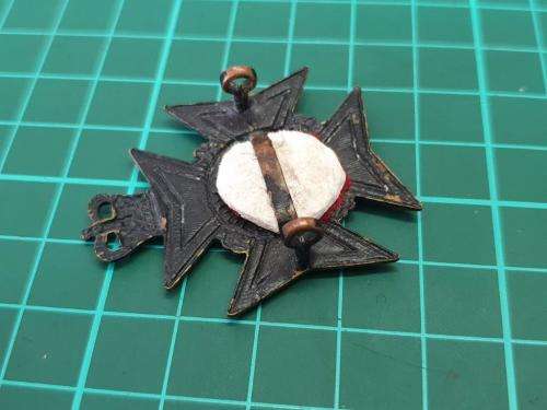 The Royal Rhodesia Regiment cap badge.