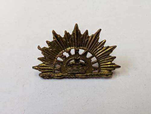 Australian Rising Sun Collar badge. Boer War to WWI. Lugs crimped.
